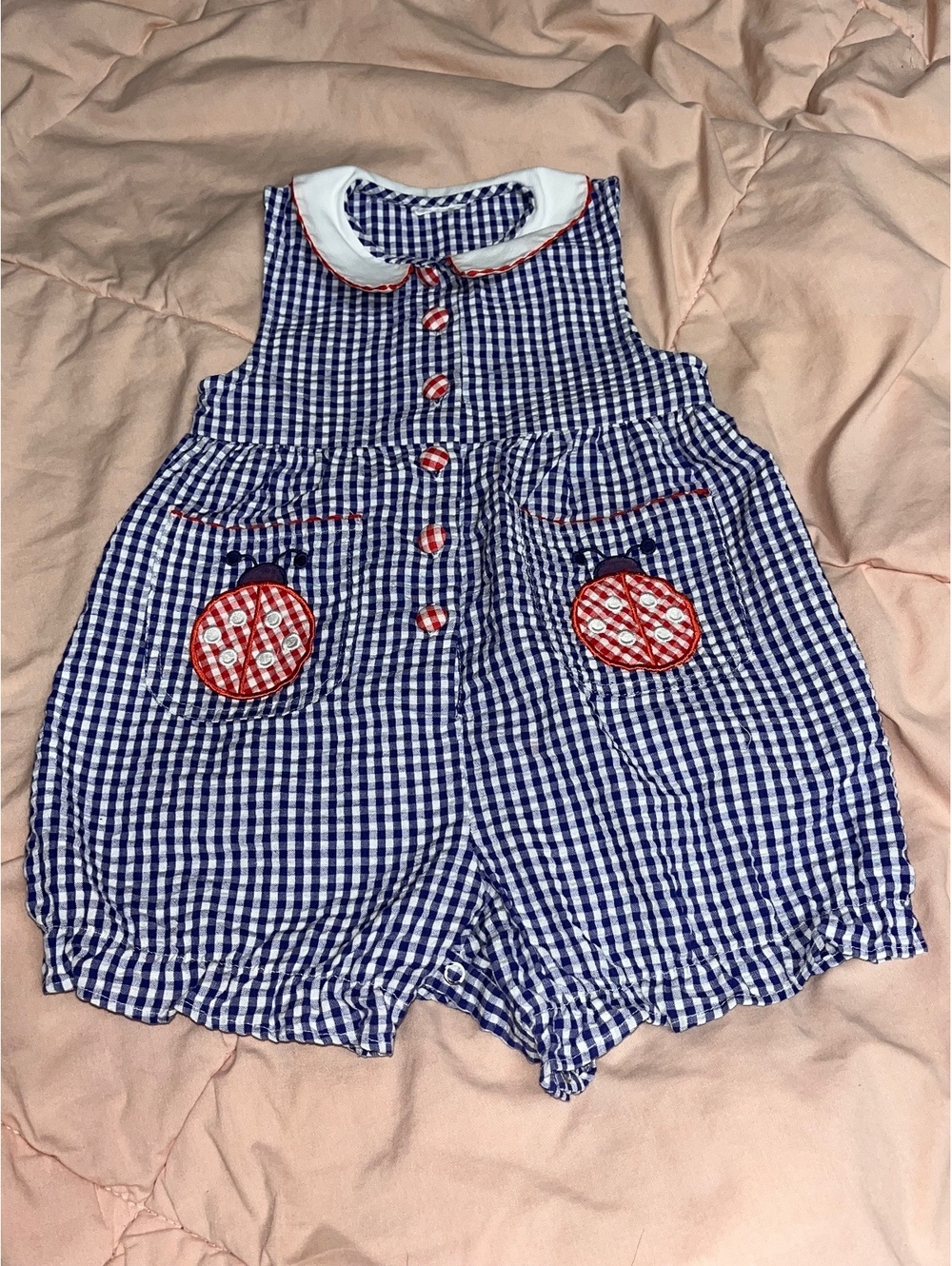 Baby blue gingham sleeveless romper